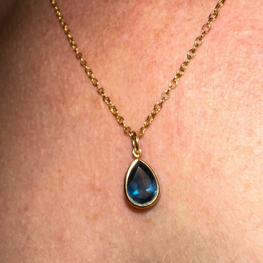 Blue Topaz and gold plated pendant with 18 inch gold plated cha
